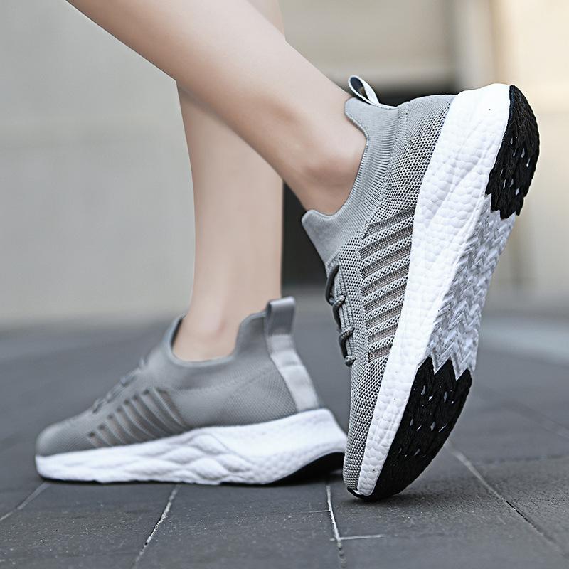 New lk flying weaving men's couple breathable sneakers hollowed out and light casual sports