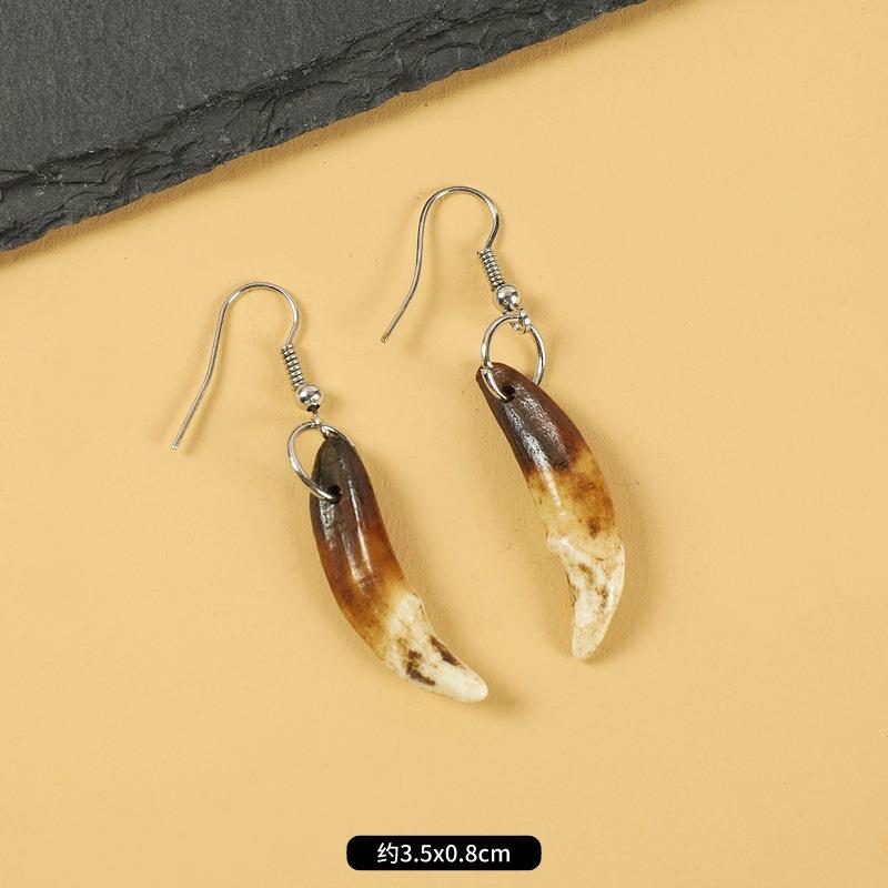 Tibetan wolf tooth earrings Tibetan silver inlaid real Tibetan mastiff dog tooth personality temperament niche earrings Tibetan earrings