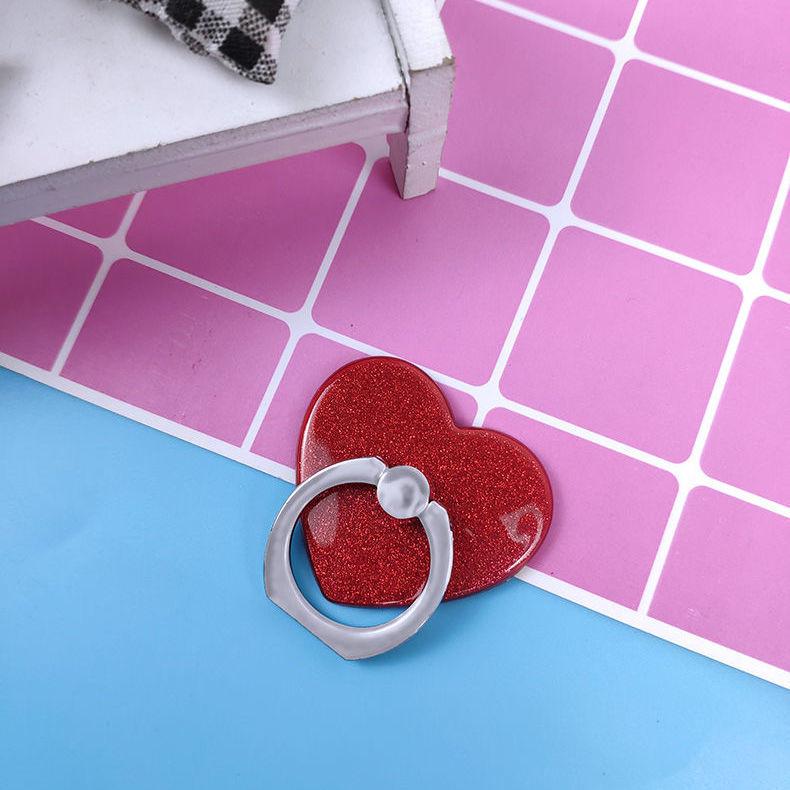 Hebilla de anillo de dedo rosa brillante con amor adhesivo, anticaída y antipérdida, hebilla de soporte universal para teléfono perezoso, pulsera de lentejuelas para hombre y mujer