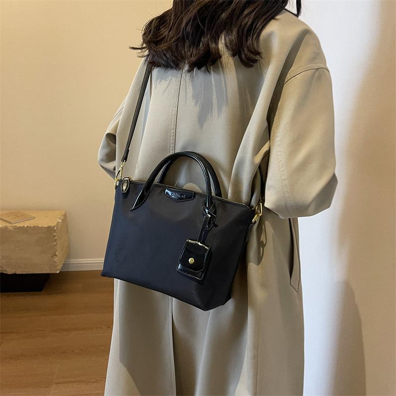 Oxford Cloth Bag Women's Large Capacity 2025 New Textured Versatile Messenger Bag Cloth Bag Portable Commuter Tote Bag