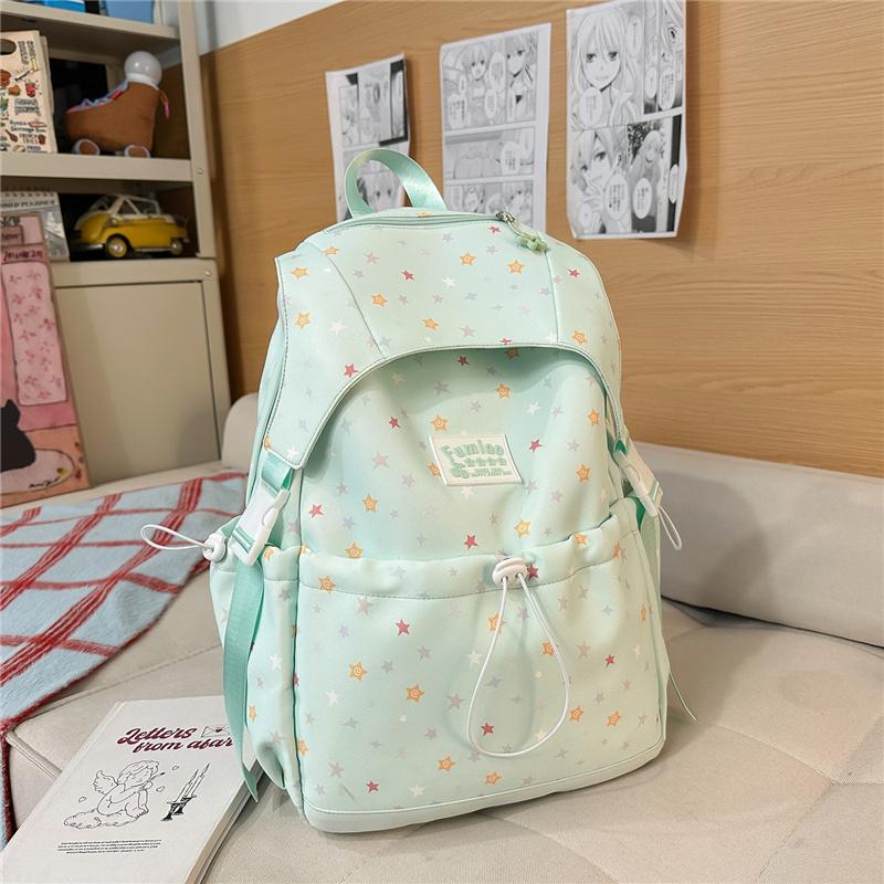 Cute Star Print Nylon Backpack for Women – Fashionable School & Daily Use Bag with Front Drawstring Pocket and Plush Charm