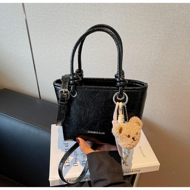 

Premium sense hand bag women s spring new trend line versatile crossbody bucket shoulder bag women чорний