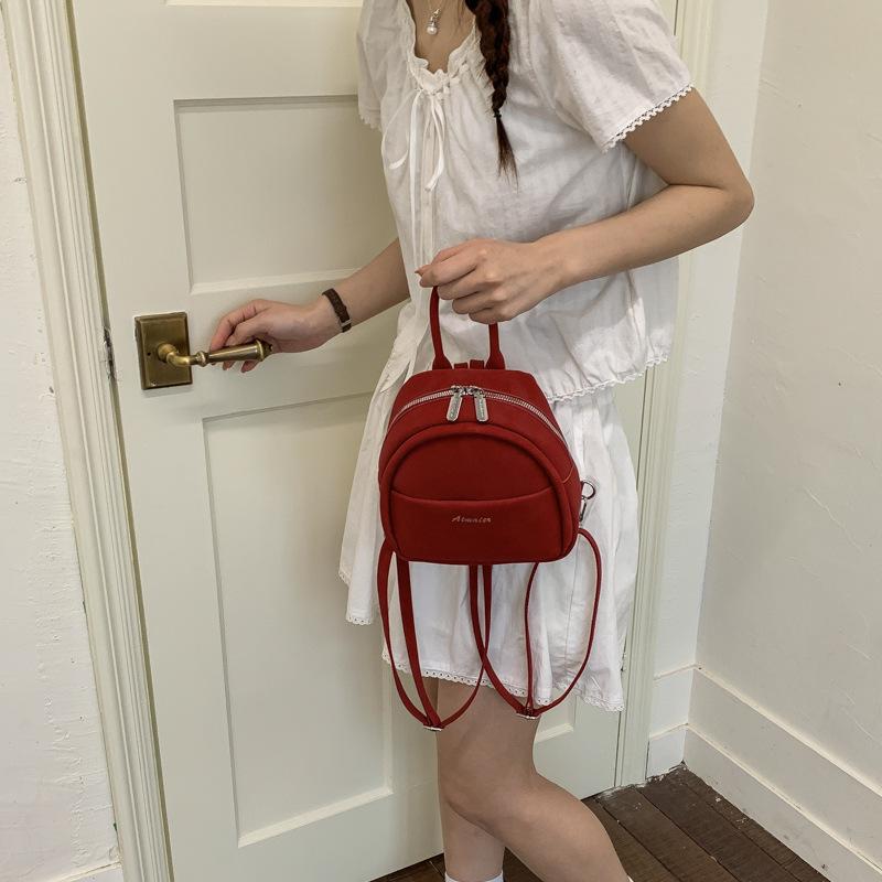 Schoolbag Korean version small fresh solid color fashion backpack women's 1011 new light travel foreign style casual portable small backpack
