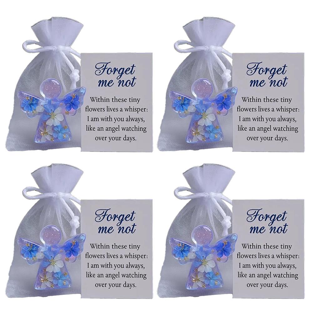 Sympathy Forget Me Not Angel present with intricate flower accents created to offer peace and remembrance in times of sorrow