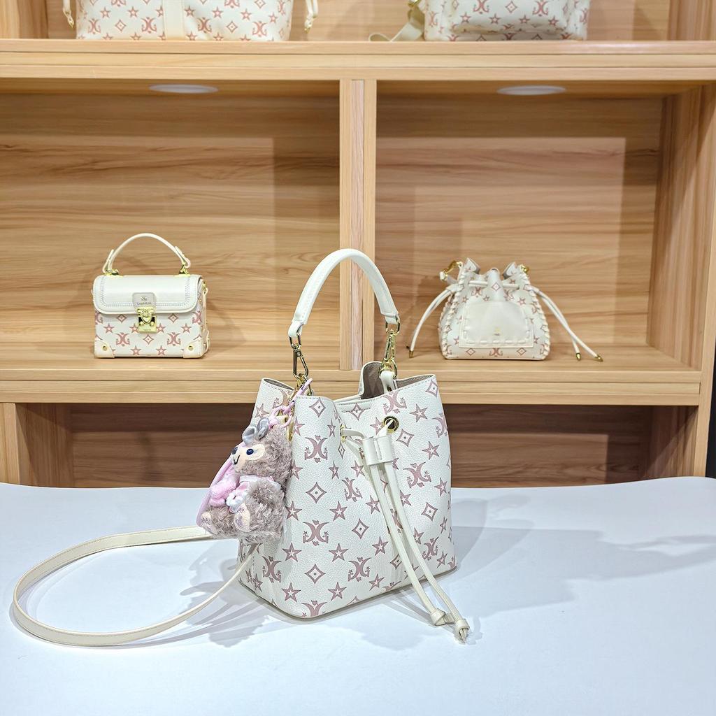 Women's Large Capacity Single Shoulder Bucket Bag with Inner Lining, Compartment Organizer, and Zippered Middle Section.