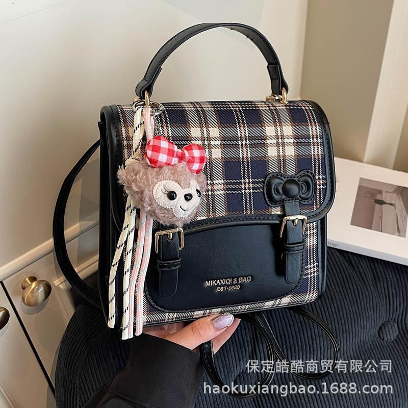 Commuter backpack for women 2025 new niche versatile plaid schoolbag fashion travel high-end small backpack