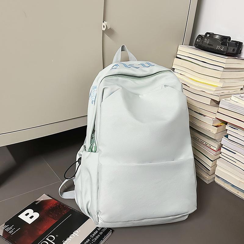High value solid color simple backpack couple light travel mountaineering large capacity backpack