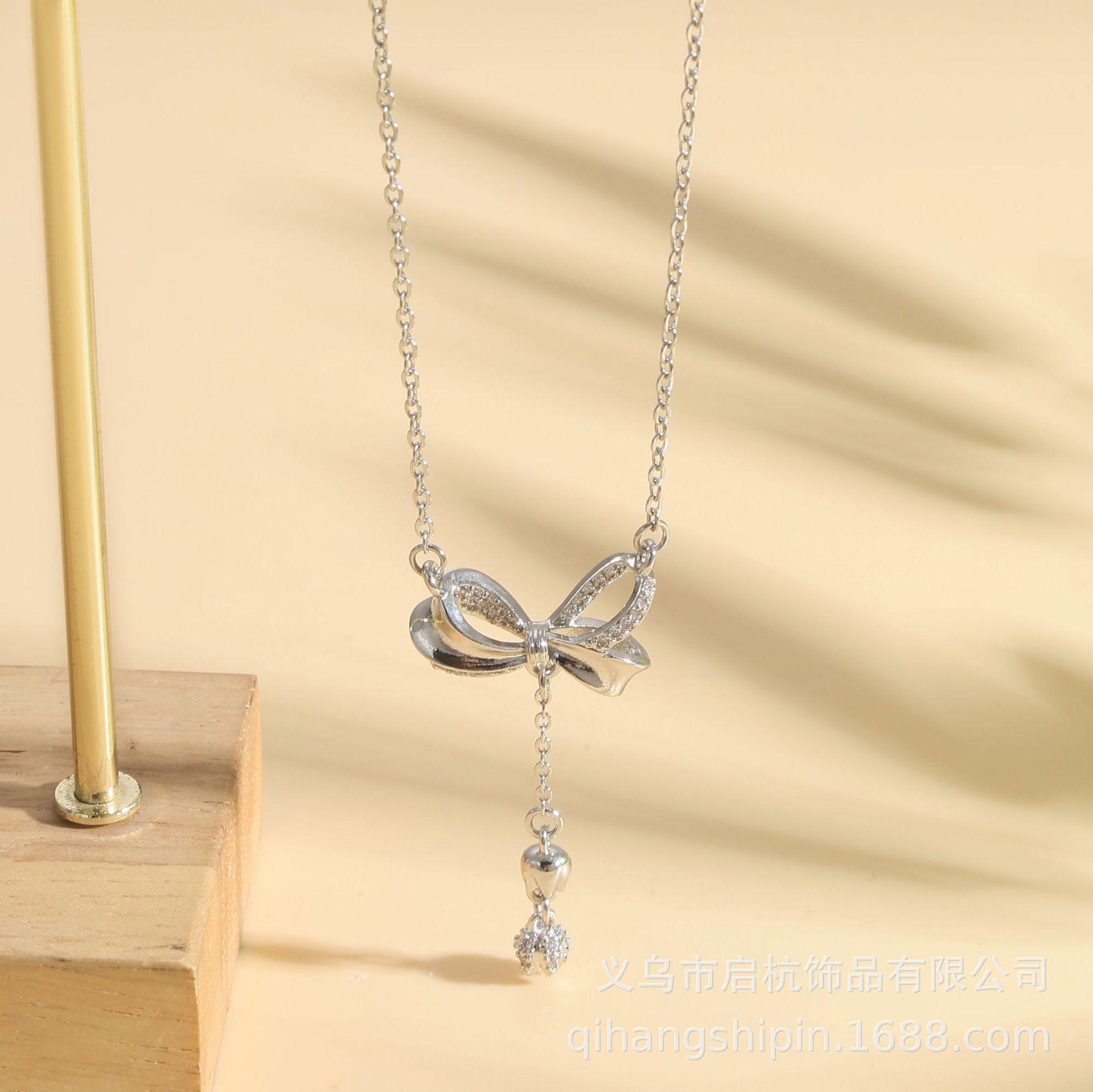 

Titanium Steel Fringed Bow Necklace Women S Light Luxury Simple High-End Versatile Lily Of The Valley Pendant Accessories
