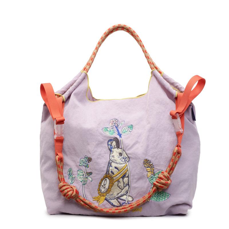 

Star same Japanese niche super cute rabbit embroidered shopping bag nylon environmental protection bag fashion shoulder handbag