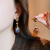 Retro Silver Resin Water Drop Pendant Earrings: Versatile, Light Luxury Studs with a High-End, Sophisticated Appeal.