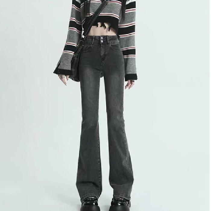 

Черно-серые узкие расклешенные женские джинсы с высокой талией и дизайном с двумя пуговицами S серый/чёрный