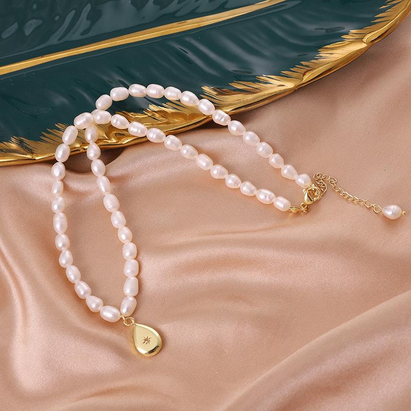 Natural freshwater pearl necklace, star heart pendant, pearl necklace, niche design, high-end sweater chain.