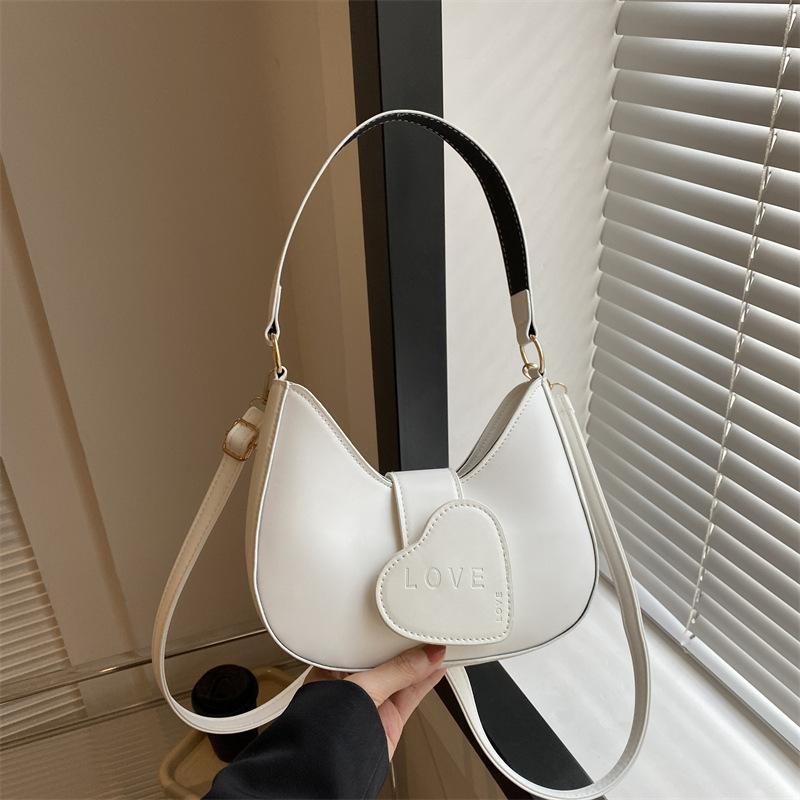 

Stylish, simple and high-texture Korean version of the versatile bag women s bag 2024 winter new niche personalized oblique span handbag білий