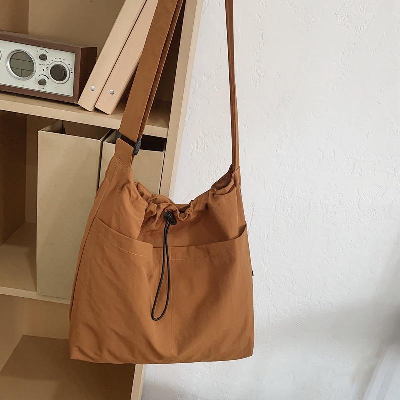 

Cloth bag women s large-capacity new summer versatile shoulder messenger bag premium bucket bag