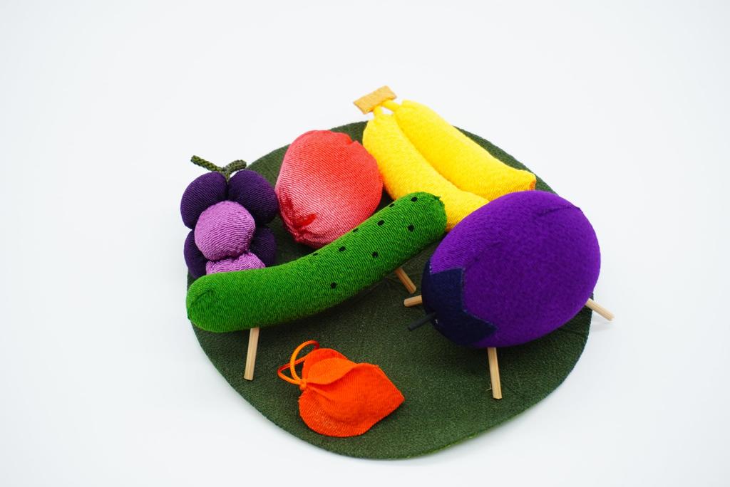 Obon Decoration Set Featuring a Cow and Horse, a Cow (eggplant) and a Horse (cucumber), Ground Cherries, Grapes, Bananas, Strawberries, and a Lotus