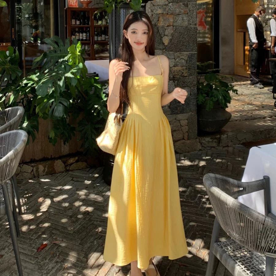 Summer New French Small Yellow Suspender Dress Women's Clothing Waist Temperament Long Dress Seaside Vacation Skirt