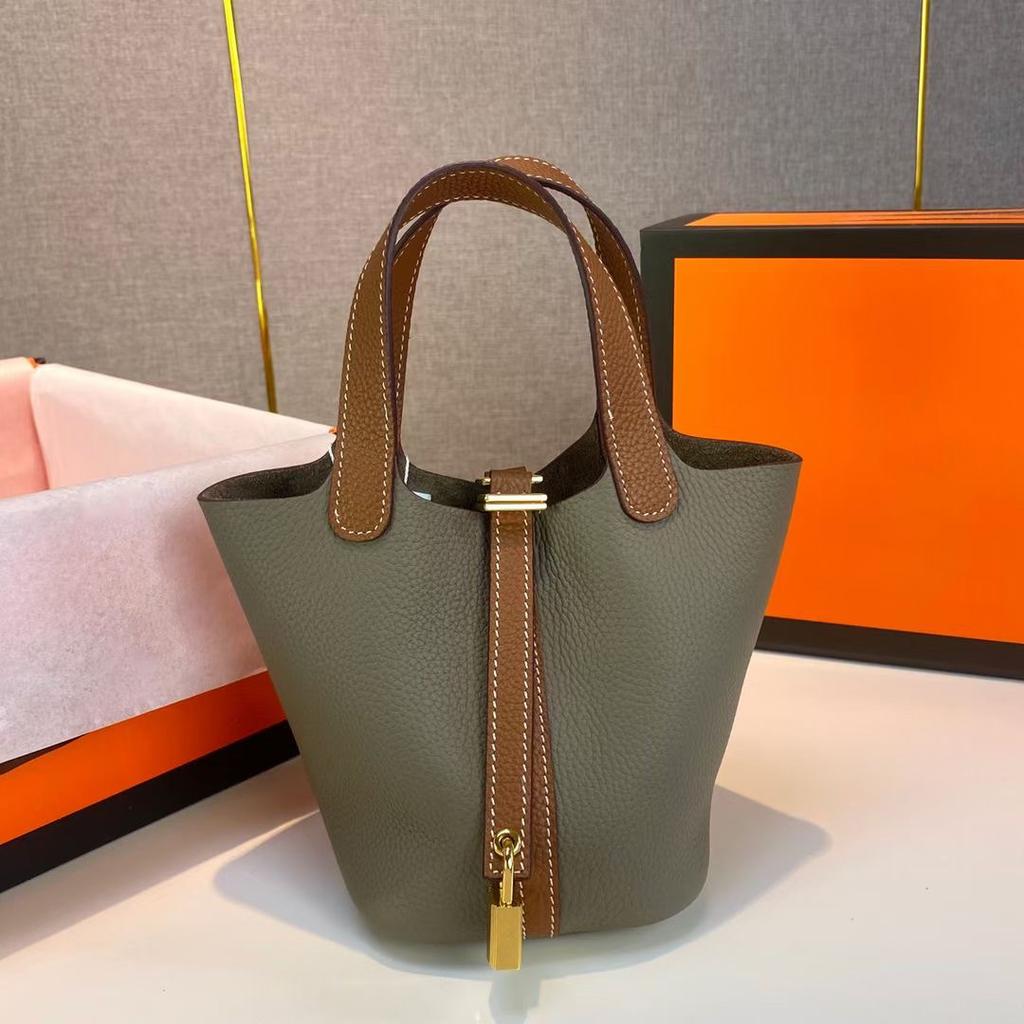 Hochwertige halbhandgefertigte Gemüsekorbtasche togo erste Schicht Rindsleder Pendlertasche echtes Leder tragbare Beuteltasche Damen 18cm