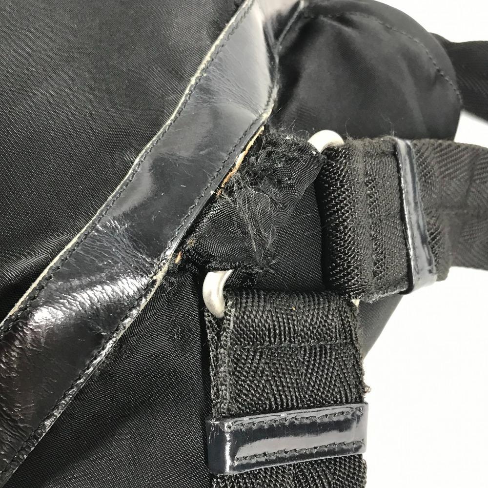 Prada Tasche mit dreieckiger Logo-Platte Rucksack Leder / Nylon Schwarz