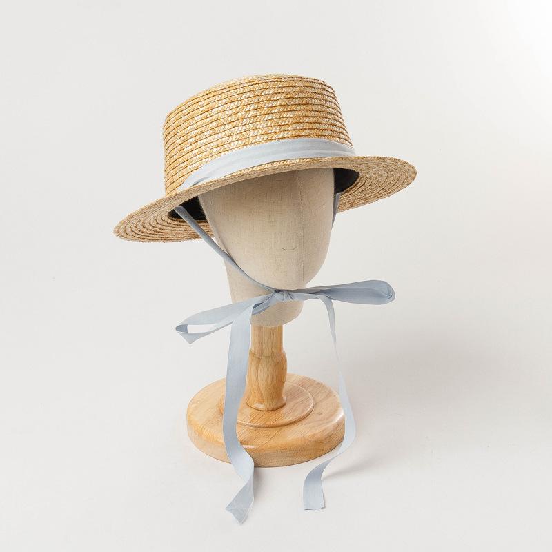 Children's spring and summer new straw flat-top straw hat with straps, outdoor beach travel, sunshade and sun protection, wide-brimmed straw hat