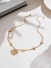 Qiong Yao 5A Zircon Heart Pendant Necklace with Diamond Accents, 18K Gold-Plated Stainless Steel.