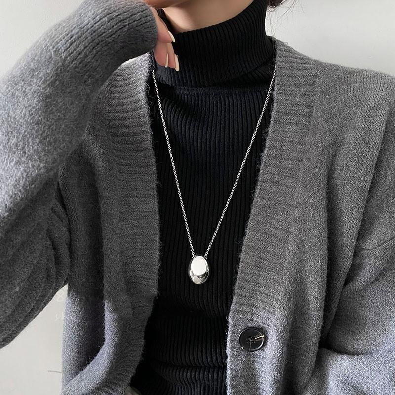 New Chinese leather pendant, fringed necklace, female ethnic style, niche retro sweater chain, fashion and high-end item jewelry.