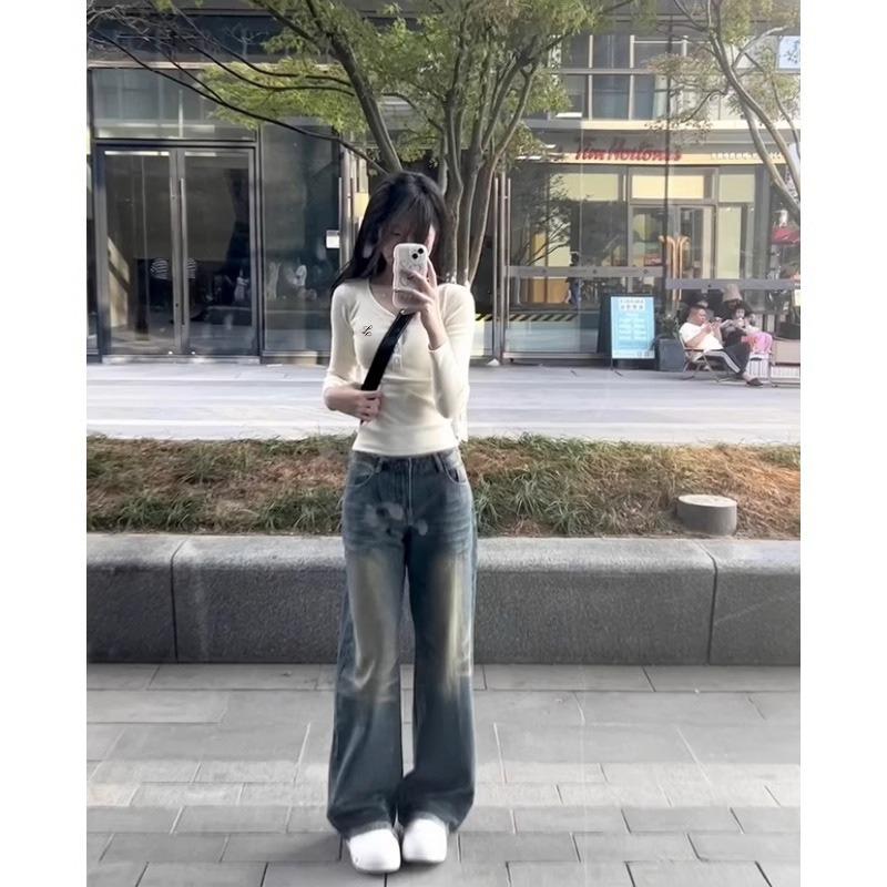 Early spring sweet and spicy collar single-breasted embroidered top women's waist pleated long-sleeved shirt with niche bottoming shirt