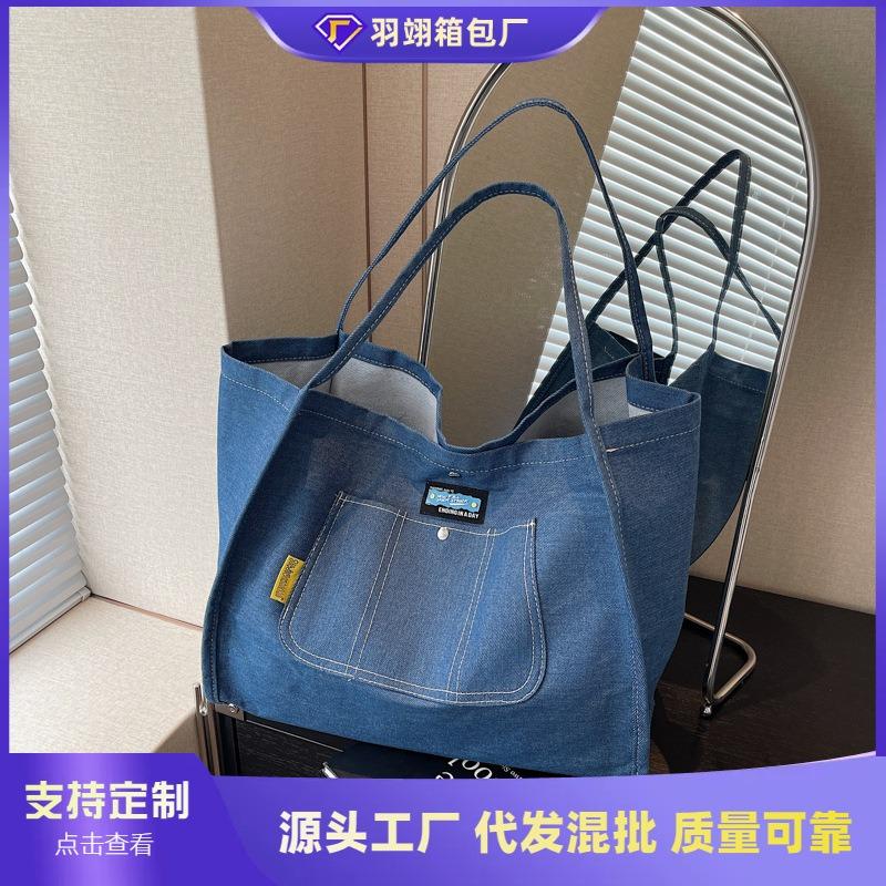 Simple and large-capacity denim tote bag women's new versatile commuter shoulder bag portable fashion shopping bag tide