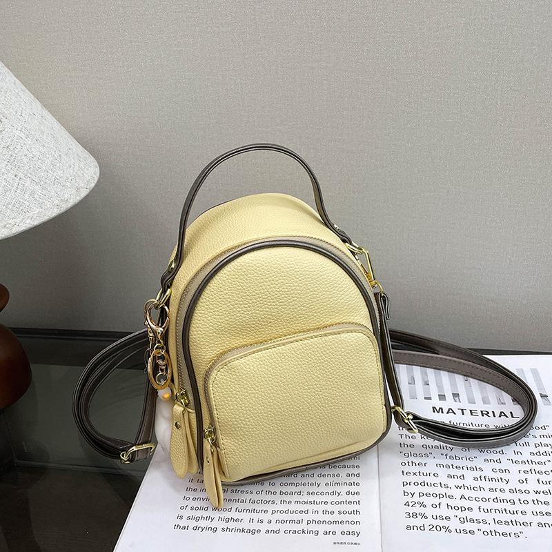 

Simple solid color fresh mini women s backpack cute roast duck pendant shoulder bag light casual portable women s bag жёлтый