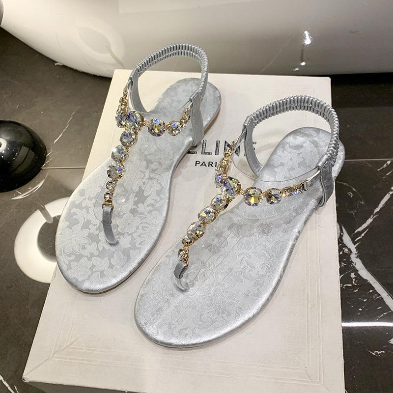 

Римские сандалии женские лето 2025 новые универсальные феи ветер леди на плоской подошве со стразами елочка стопа пляжные женские туфли 43 серебряный