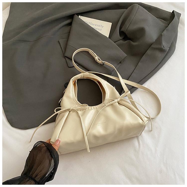 

2025 сумка с ремешком-бантом корейская простая сумка-мессенджер повседневная большая вместимость модная сумка на запястье женская белый