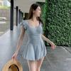 Simple and sexy fitted swimming suit for women - one-piece dress for swimming. Swimwear.