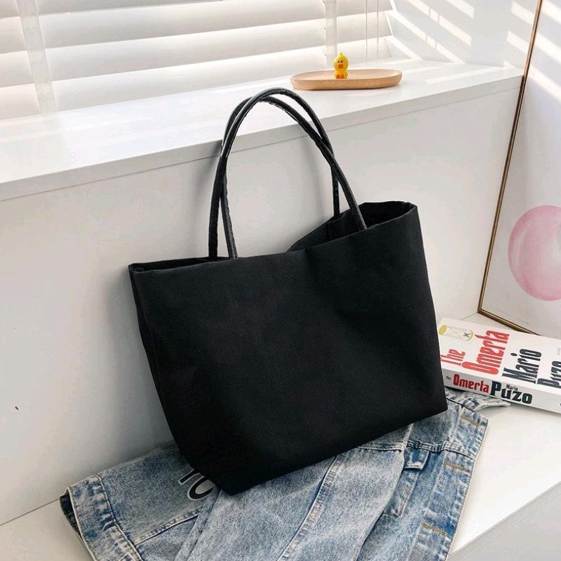 

Корейская версия простая однотонная холщовая сумка женская литературная сумка через плечо школьная сумка для школьников портативная большая сумка для покупок сумка-тоут 32*30*16cm чёрный
