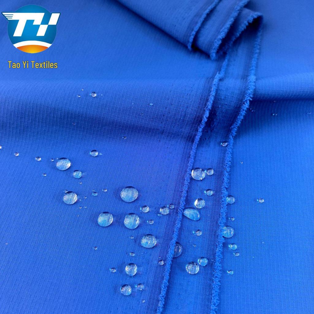 In Stock: 70D Nylon Stretch Checkered Racing Suit Pants, Ski Suit, Sun Protection Sportswear, Windbreaker Jacket.