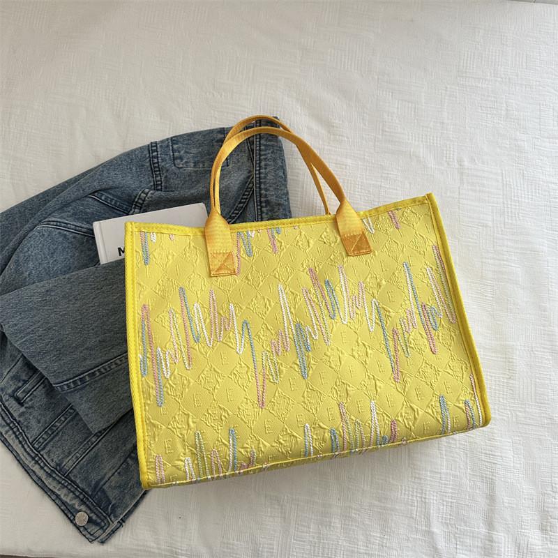 Fashionable Medium Sized Womens Tote Bag With Soft Structure And Interior Pockets