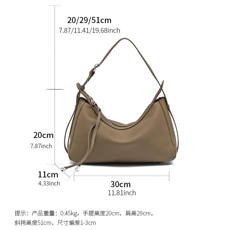 The first layer of cowhide new soft dumpling bag women's versatile niche high-end handbag shoulder messenger bag