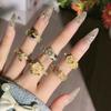 Palace style mixed and matched flower brushed hollow retro inlaid temperament open ring women's exquisite light luxury fashion ring