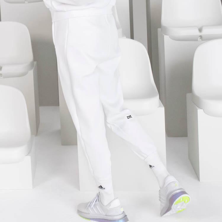 Adidas ZNE. Řada SS23 Jednobarevné volné tepláky s manžetou Dámské spodní díly Bílé IN5140