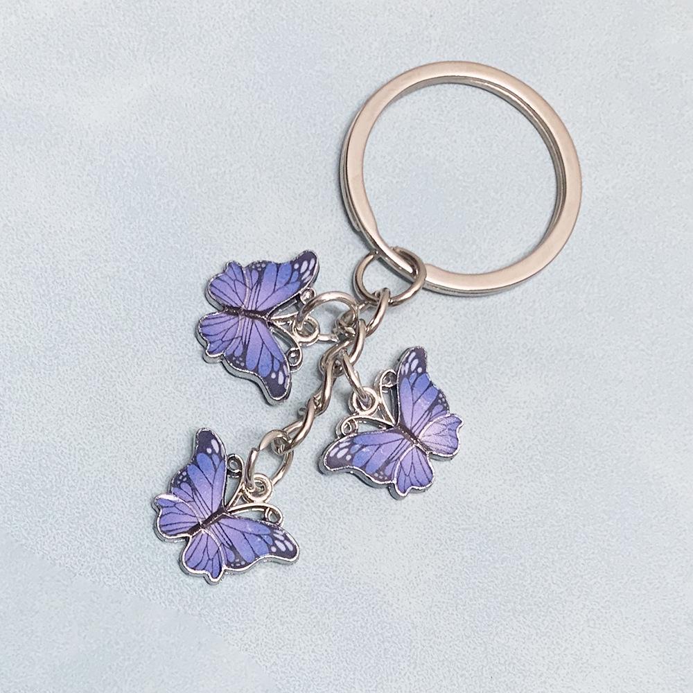 

Новий барвистий брелок із зображенням метелика – аксесуар для подарункових сумок для Європи та Америки фіолетовий