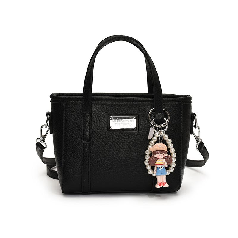 Spring hot sale lychee pattern high-end portable bucket bag Korean version casual small fresh temperament versatile messenger women's bag