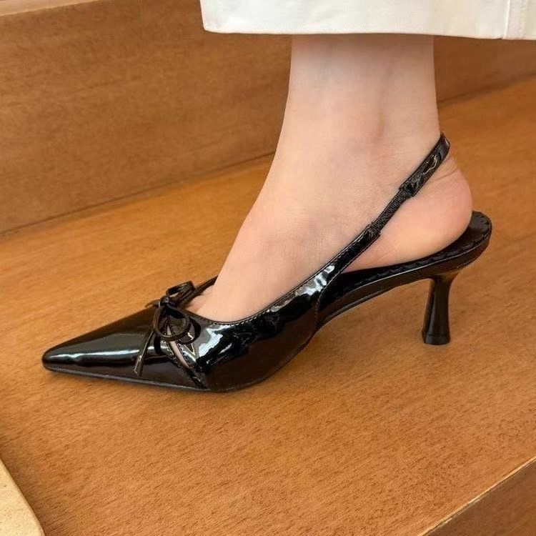 Bow temperament high heels women's bag head spring and summer 2025 shallow mouth empty sandals French middle heel pointed women's shoes