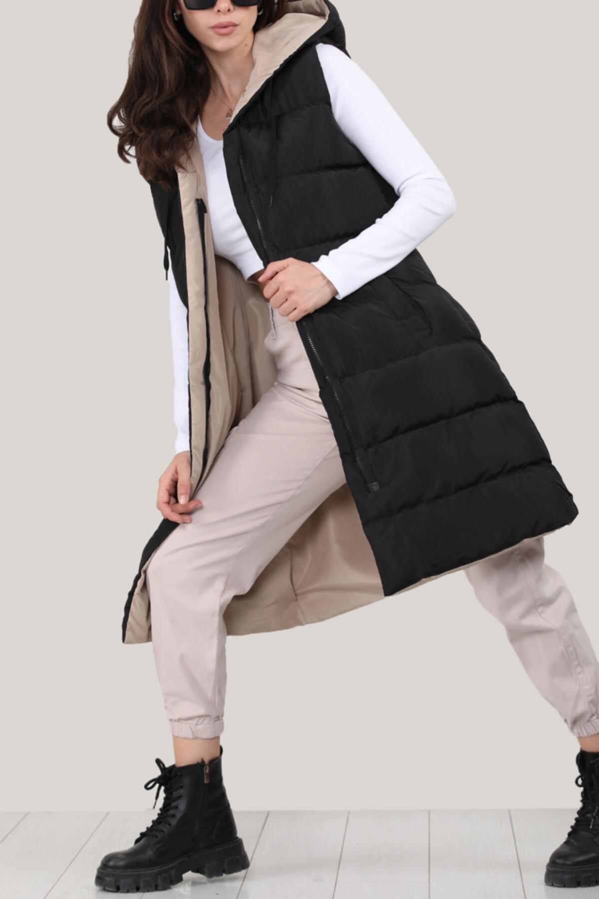 

Женский пуховик с капюшоном 36 чёрный