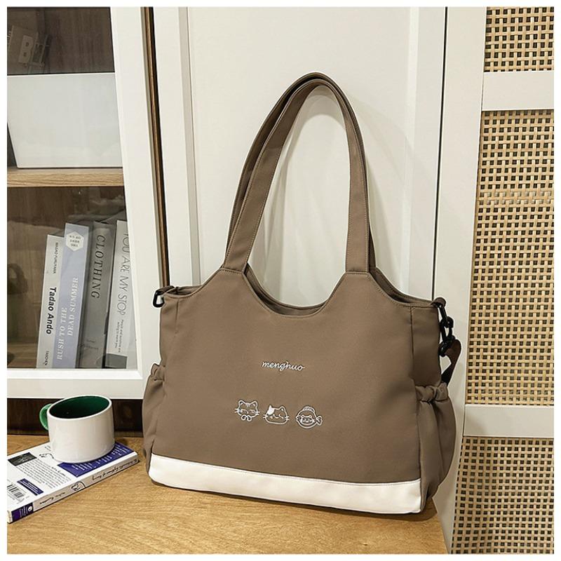 

Niche design solid color simple literary style tote bag women s new high value, light and versatile large capacity messenger bag
