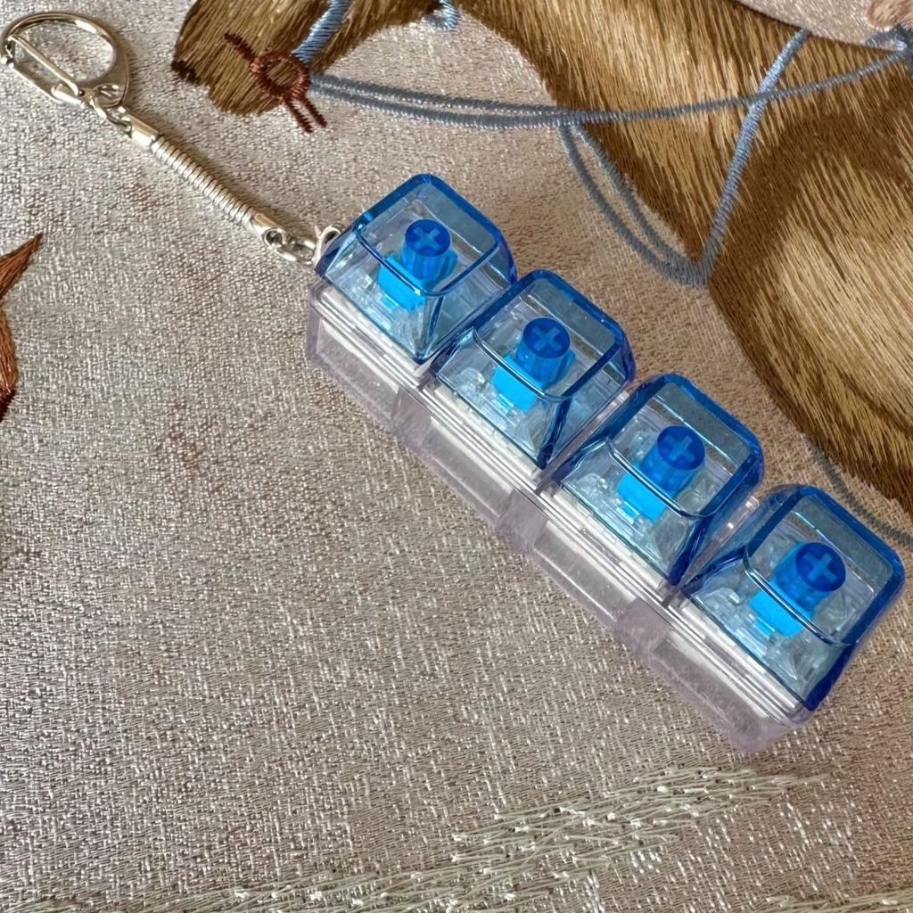 LED Fidget Tastenkappe Spielzeug - Kristall Clicker Sensorisches Spielzeug zur Stressbewältigung Tastatur Schlüsselanhänger Fidget Gadget für Erwachsene Kinder