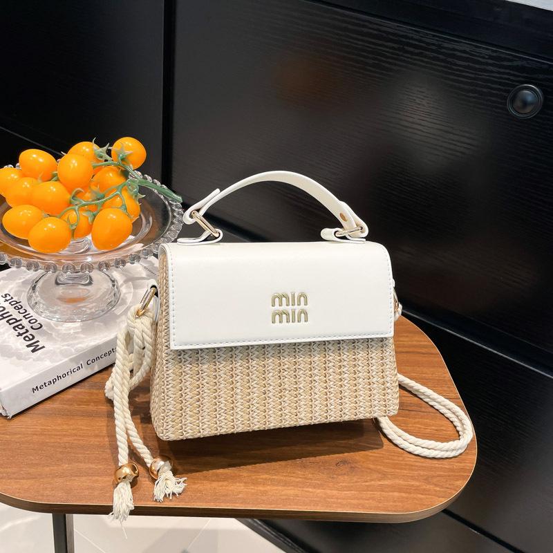 Niche design bag women's new fashion versatile shoulder messenger bag high-end straw handbag
