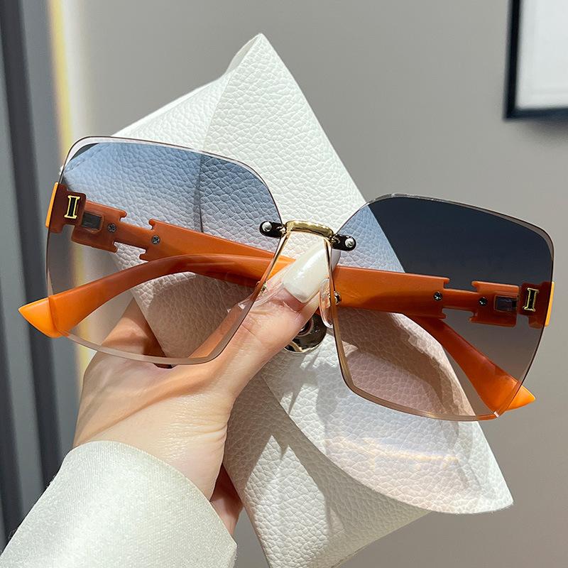

New Internet celebrity frameless UV protection trend sunshade temperament large frame versatile sunglasses sunglasses women s glasses