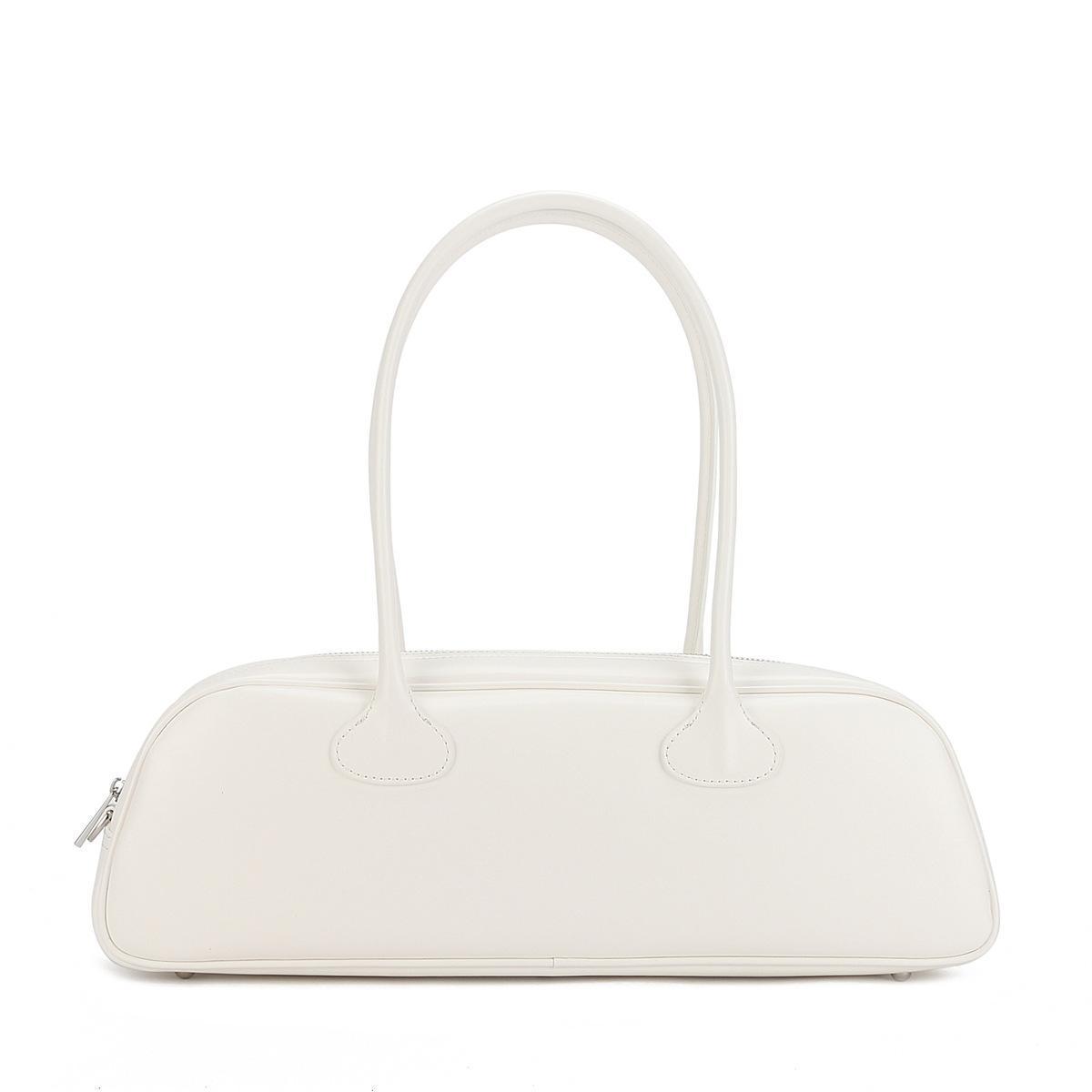 

Корейская нишевая сумка-багет из коровьей кожи, сумка-боулинг - Большая вместимость, стильный дизайн под мышкой