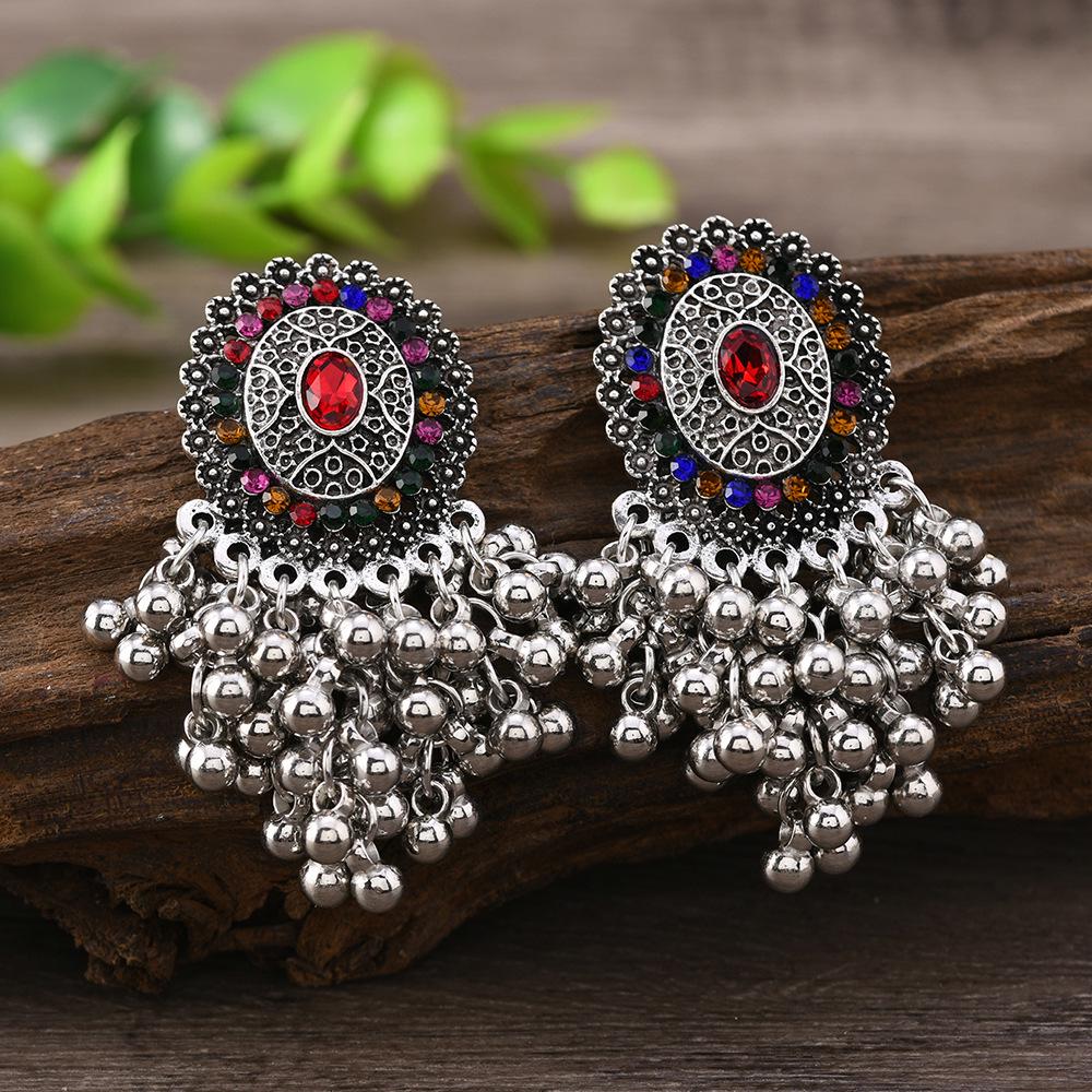 Retro Indian Alloy Rice Bead Tassel Earrings with Scenic Design