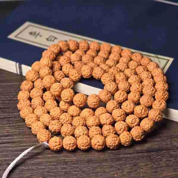 Handcrafted Dragon Scale Bodhi Seed Bracelet with Red Burst Finish