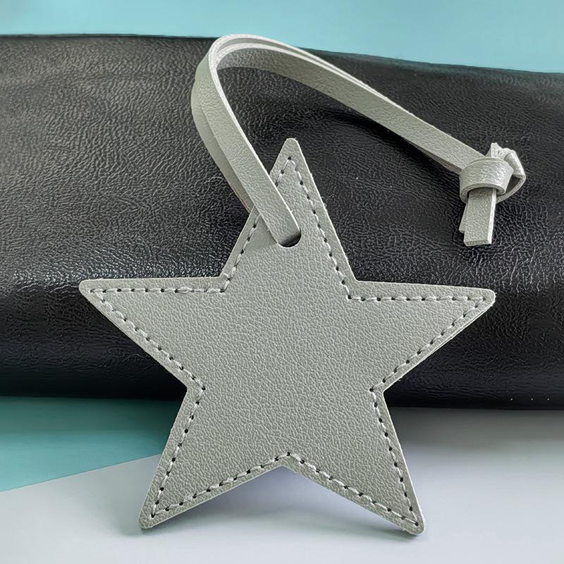 

Stocked PU Pentagram Bag Pendant: Simple Leather Star Keychain Charm