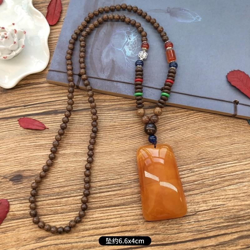 Retro chicken wing wood second generation old beeswax necklace men and women versatile amber pendant long sweater chain pendant